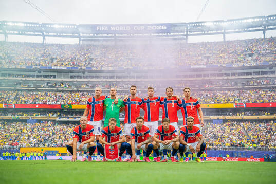 The starting eleven of Norway pose for a team photo
