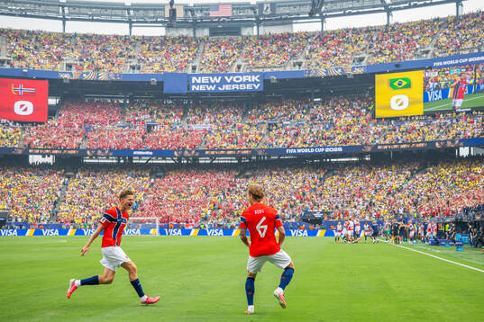 Patrick Berg of Norway celebrates with teammate David