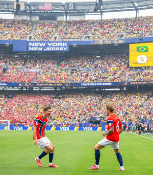 Patrick Berg of Norway celebrates with teammate David
