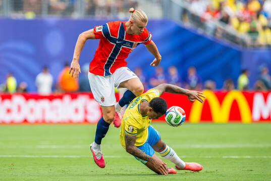 Erling Braut Haaland of Norway and Gabriel Magalhaes of