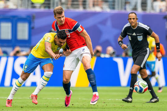 Casemiro of Brazil and Alexander Sørloth of Norway