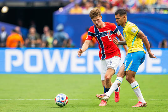 David Møller Wolfe of Norway and Bruno Guimaraes of Brazil