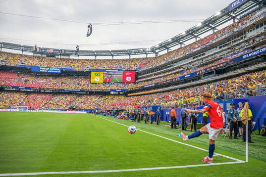 Patrick Berg of Norway takes a corner kick