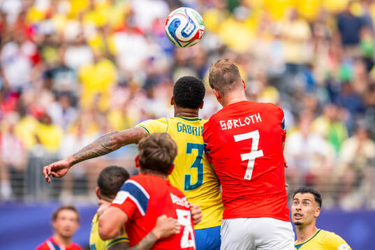 Gabriel Magalhaes of Brazil and Alexander Sørloth of Norway