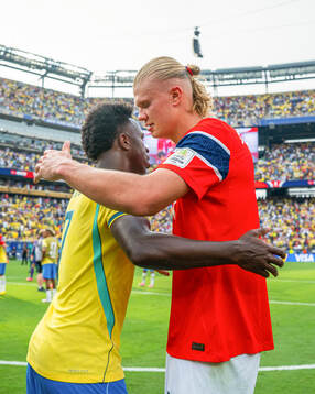 Vinicius Junior of Brazil and Erling Braut Haaland of Norway