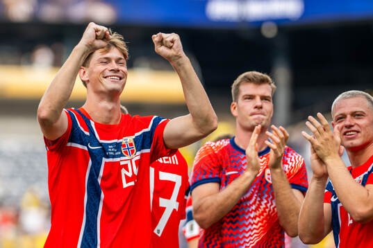 Henrik Falchener of Norway celebrates