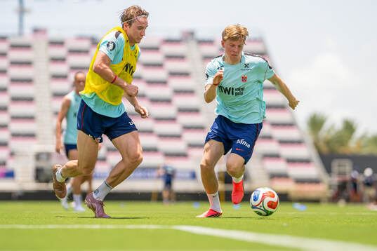 Kristian Thorstvedt and Jens Petter Hauge of the Norwegian