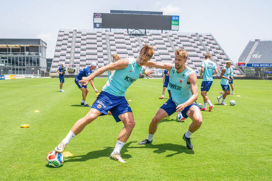 Henrik Falchener and Kristoffer Ajer of the Norwegian