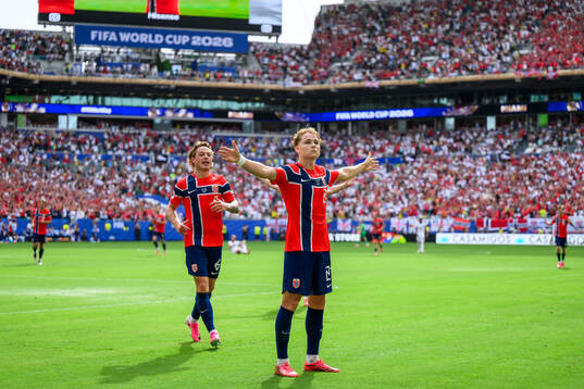 Patrick Berg and Andreas Schjelderup of Norway celebrate 1-0