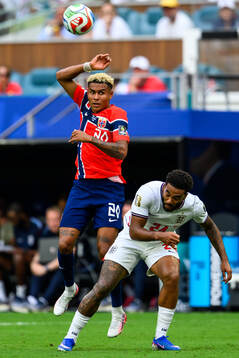 Antonio Nusa of Norway and Reece James of England