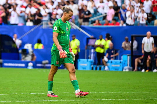 goalkeeper Ørjan Nyland of Norway looks dejected