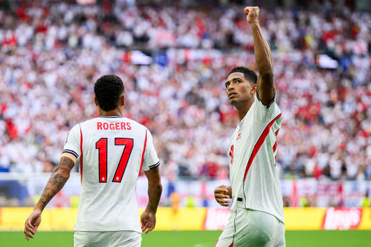 Morgan Rogers and Jude Bellingham of England celebrate