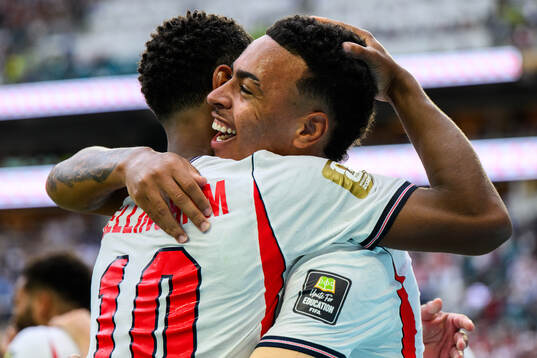 Jude Bellingham and Morgan Rogers of England celebrate