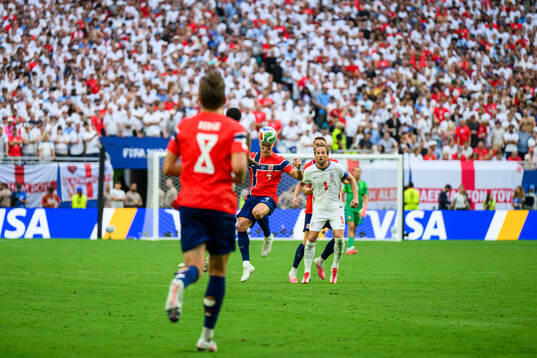 Leo Østigård of Norway and Harry Kane of England