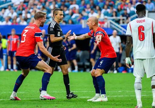 Kristoffer Ajer and Leo Østigård of Norway against