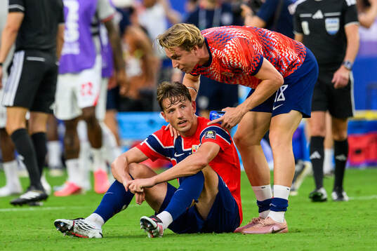 Sander Berge of Norway looks dejected