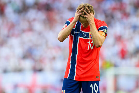 Martin Ødegaard of Norway looks dejected