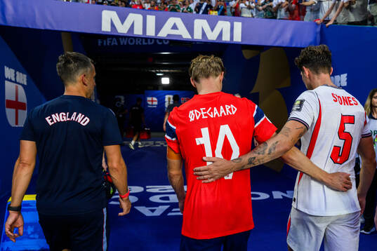 Martin Ødegaard of Norway and John Stones of England