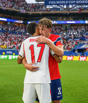 Morgan Rogers of England and Sander Berge of Norway