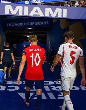 Martin Ødegaard of Norway and John Stones of England