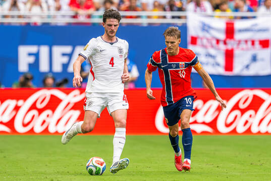Declan Rice of England and Martin Ødegaard of Norway