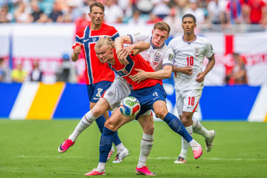Erling Braut Haaland of Norway and Elliot Anderson of
