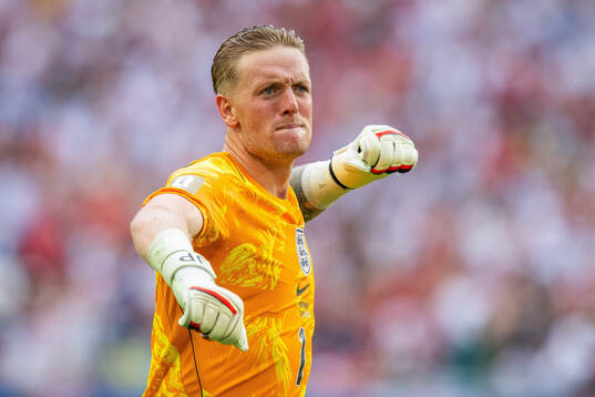 Goalkeeper Jordan Pickford of England celebrates
