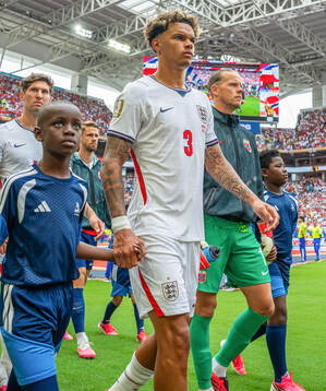 Nico O'Reilly of England and goalkeeper Ørjan Nyland of