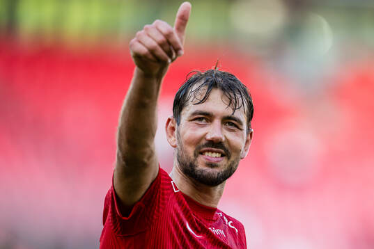 Fredrik Pallesen Knudsen of Brann celebrates