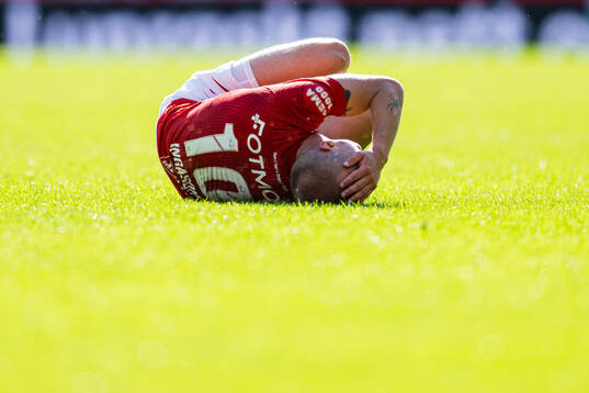 Kristall Mani Ingason of Brann in pain