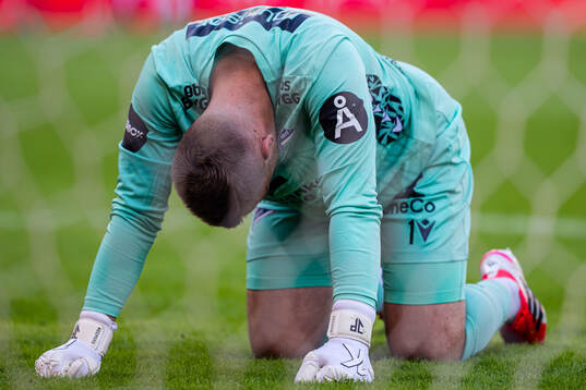 Goalkeeper Jacob Pryts Larsen of Start looks dejected