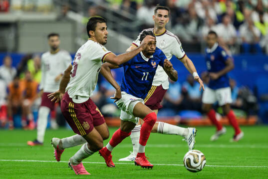 Rodri of Spain and Michael Olise of France