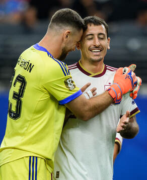 goalkeeper Unai Simon and Mikel Oyarzabal of Spain