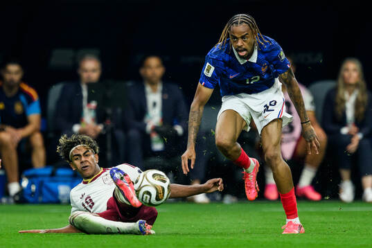 Lamine Yamal of Spain and Bradley Barcola of France