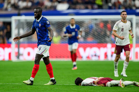 Dayot Upamecano of France and Alex Baena of Spain