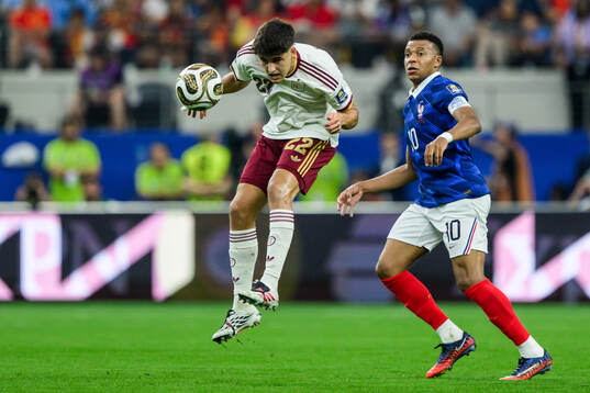 Pau Cubarsi of Spain and Kylian Mbappe of France