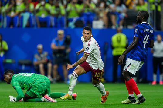 Pedro Porro of Spain celebrates