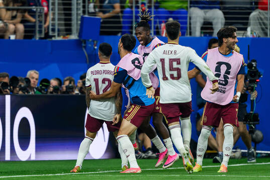 Pedro Porro of Spain celebrate with teammates