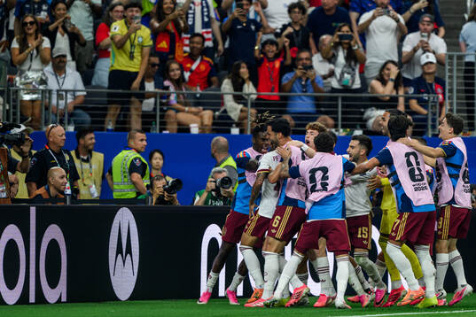 Pedro Porro of Spain celebrate with teammates