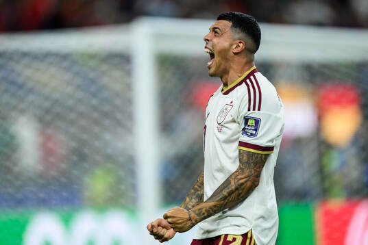 Pedro Porro of Spain celebrates