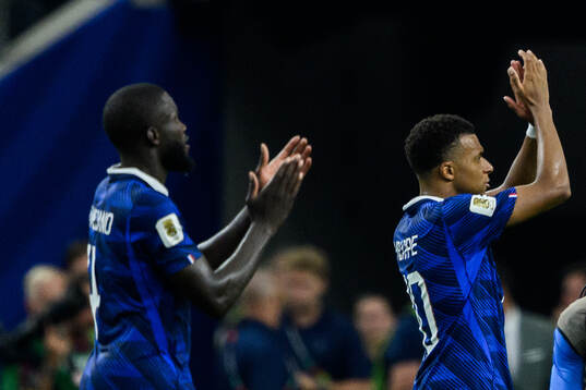 Dayot Upamecano and Kylian Mbappe of France