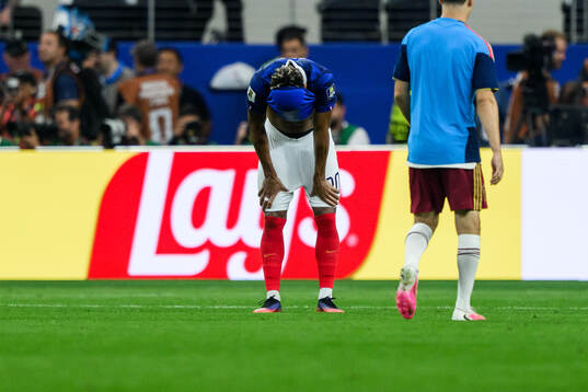 Desire Doue of France looks dejected