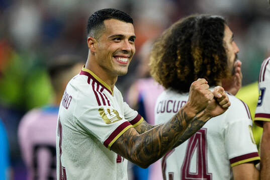 Pedro Porro of Spain celebrates
