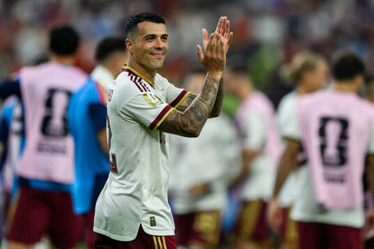 Pedro Porro of Spain celebrates