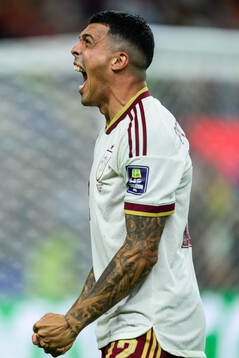 Pedro Porro of Spain celebrates