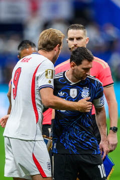 Harry Kane of England and Lionel Messi of Argentina