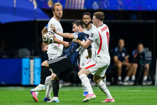 Harry Kane and Elliot Anderson of England against Lionel