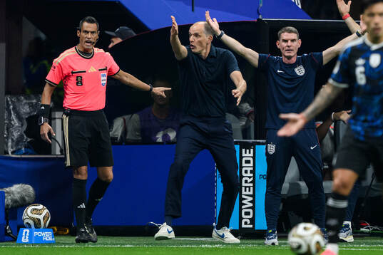 Head coach Thomas Tuchel of England reacts
