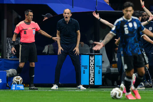 Head coach Thomas Tuchel of England reacts