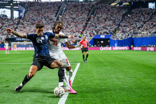 Enzo Fernandez of Argentina and Djed Spence of England